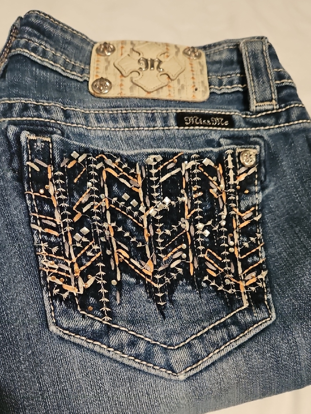 Miss Me Blue Denim Jeans with Embroidered & Studded Back Pocket